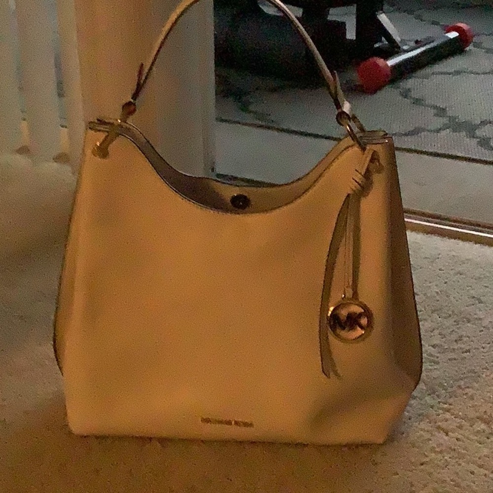 Off white color shoulder bag